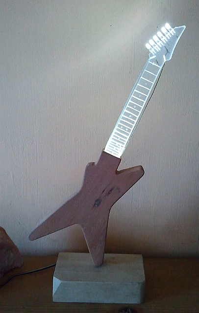 LED lamp, wodden base and guitar body, acrylic glass guitar neck with six withe LED's as machine heads